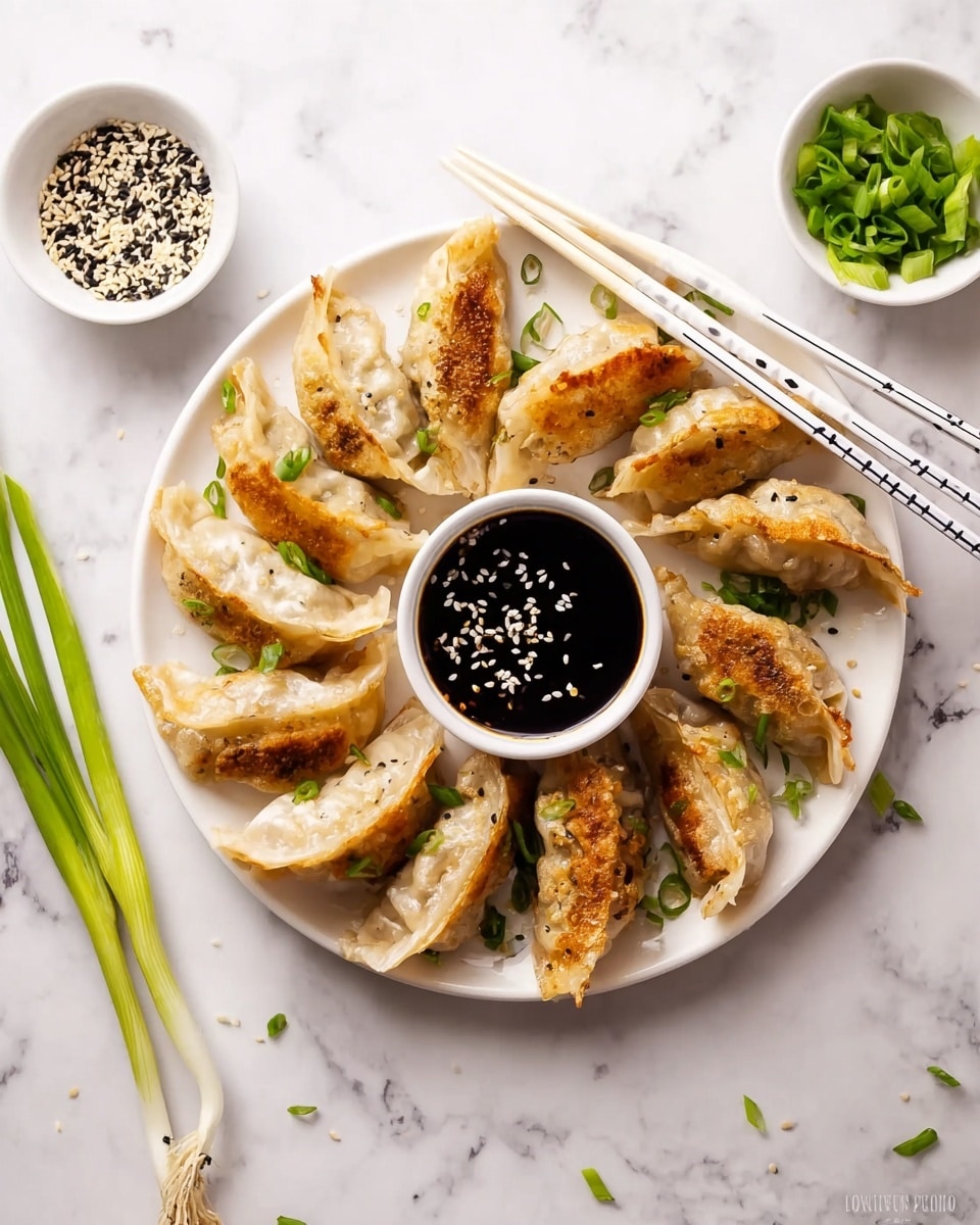 A white round plate holds nine golden-brown fried dumplings arranged in a circular shape, each dumpling showing crispy, browned edges and soft, light beige folds on top. Chopsticks with white and black stripes rest on the top edge of the plate. In the center of the plate is a small white bowl filled with dark soy sauce, topped with white sesame seeds. Green onion pieces are scattered over and around the dumplings. The plate sits on a white marbled surface, with two small white bowls nearby—one with black and white sesame seeds, the other with chopped green onions—and a few whole green onions to the side. photo taken with an iphone --ar 4:5 --v 7